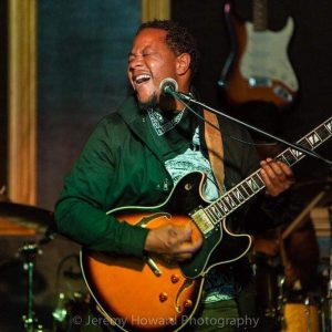 Guitarist Steven Williamson performing with True Blue at The Mailroom Speakeasy